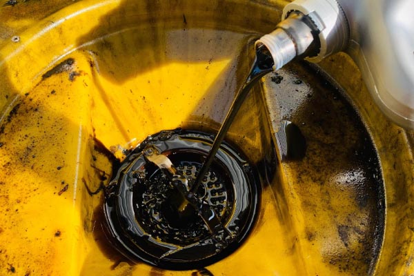 Alpha Associates Used Engine Oil recycling, sustainable oil collection services, resource recovery